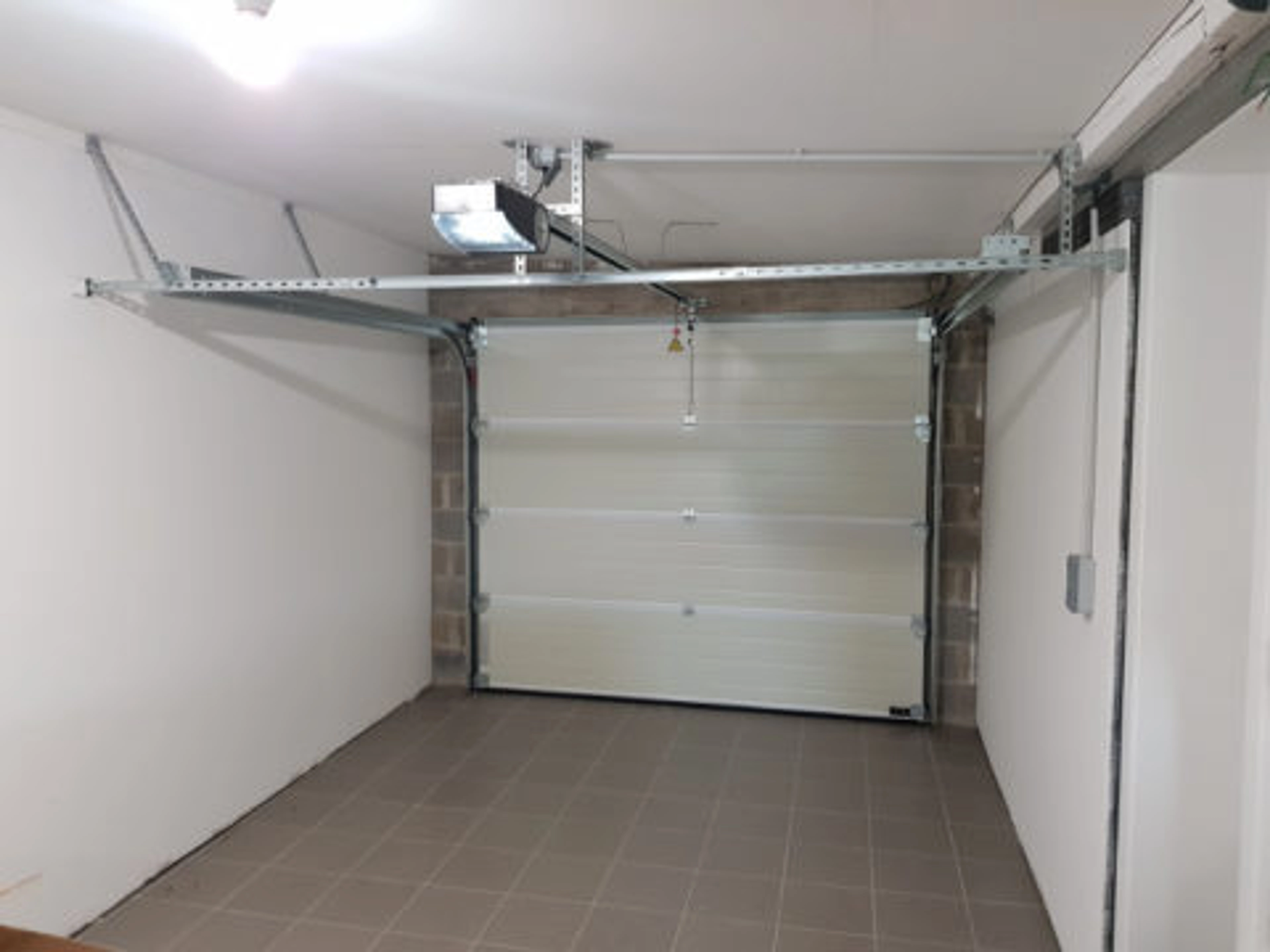 Comment rembrayer une porte de garage